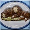 P38. Lion pottery plaque. 